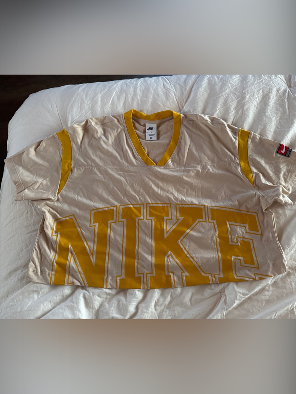 Nike Cream Tee with Bold Yellow Graphic Trim